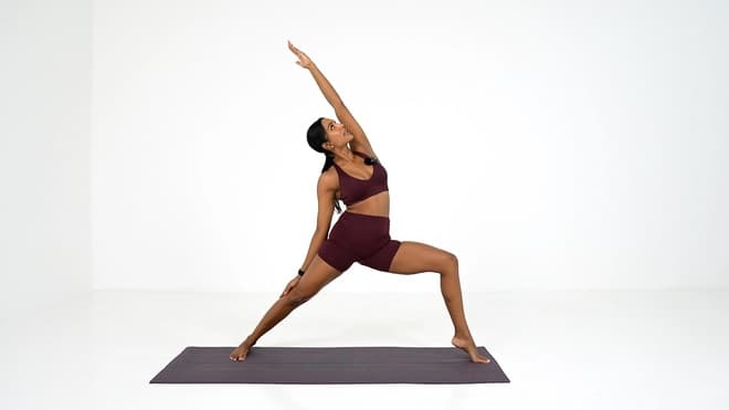 Tree Pose demonstrated by a certified trainer